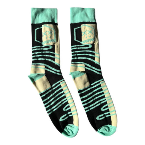Pair of streetwear dress socks featuring a mint Boxhead outline with 'XX' eyes knitted into a mint and cream wavy striped pattern.