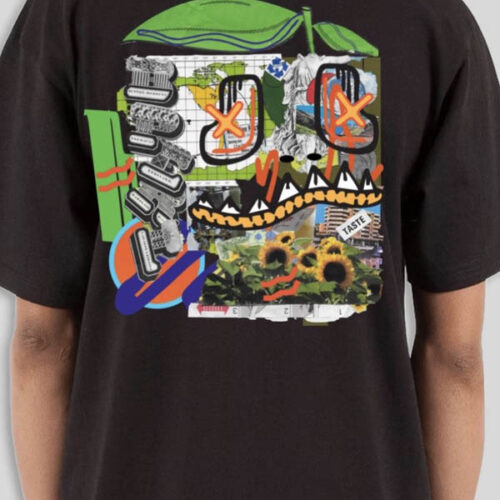 Bperl original analog-digital collage print on the back of the "Bperl Taste Tee". Design includes bold mash-up graphics with blue outline, green head, orange eyes, white teeth, and red nostrils. Photo shows a model wearing the shirt, showing the back of the tee.